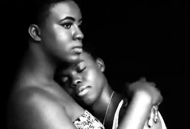 Afrofeminism: two women of African descent embracing each other.